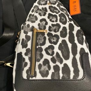 Kids small black and white leopard print backpack with gold zippers